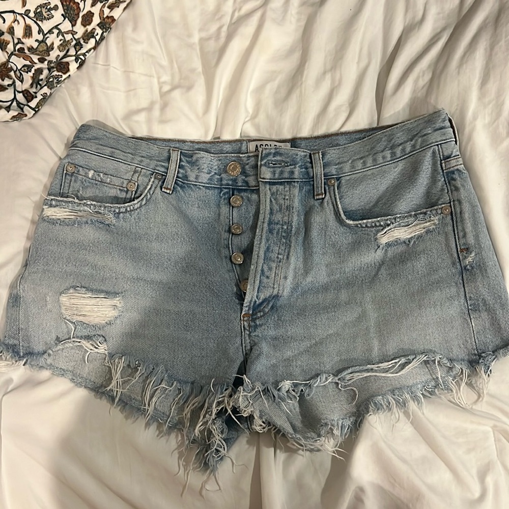 AGOLDE distressed light denim shorts
